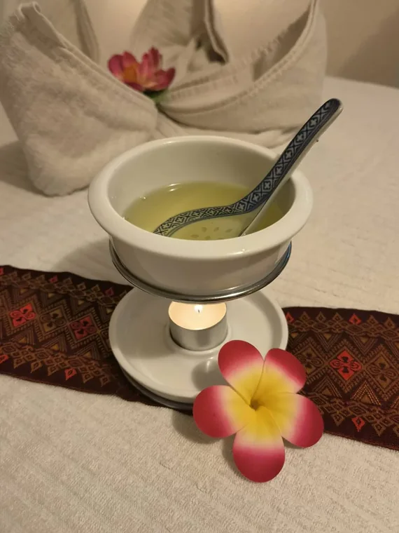 Massage aux huiles chaudes